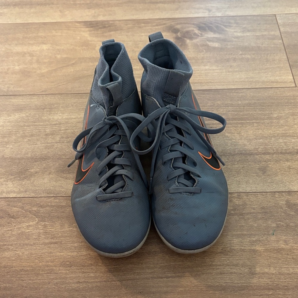 Used, boy’s soccer cleats, grey mercurial Nike cleats